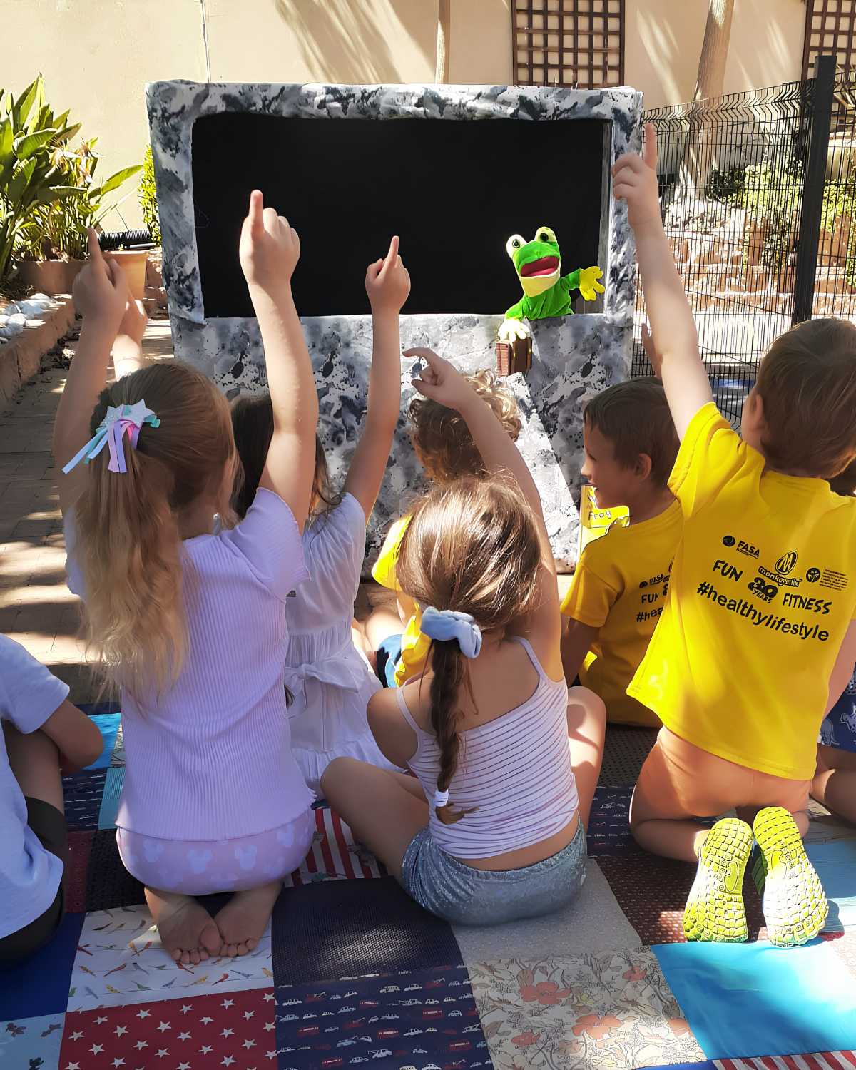 Children enjoying an activity at THE OAK TREE Playschool